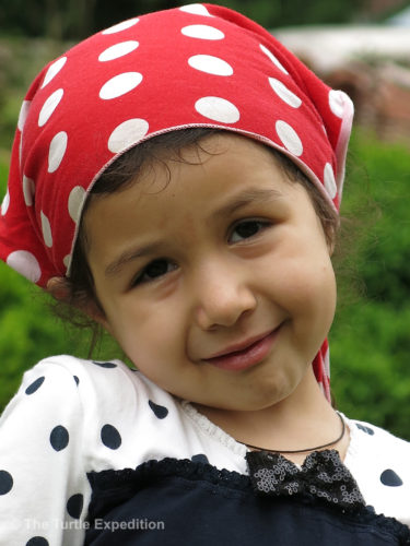 This little doll was waiting for her parents visiting the church. Monika exchanged a photo for a balloon.