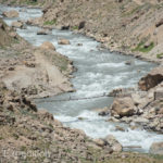 Glacial melt from the surrounding peaks fed tributaries to the main river, the Panj.