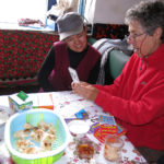 The owner, Tursun, invited us for tea and Monika gave her some fun children games for her young daughter.