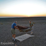 Folding up Green’s tent was a fast morning job.
