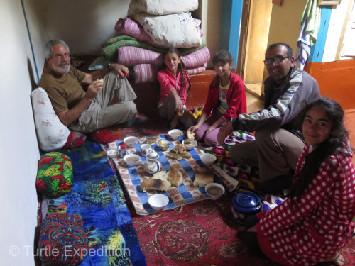 The traditional morning breakfast in the Pamirs is black milk tea with a touch of butter and homemade bread.