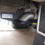 Magnaflow Performance Exhaust installed a flow-through muffler and custom pipes to minimize problems with deep water crossings and provide clearance on fuel tank and mud flap.