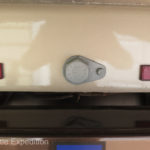 A close-up of the critical pivot bolt that separates the movement of the chassis from the camper.