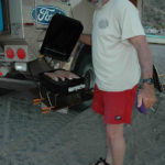 The BBQ Chef is inspecting his work.