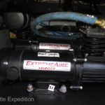 Dual ExtemeAire Magnum 12 Volt compressors keep our aluminum 5-gallon AccuAir reserve tank topped up 120 psi. Our ARB Locker, air horns and Hellwig suspension air bags depend on them.
