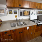 The Corian we used for countertops has survived extremely well. Small scratches can be polished out.