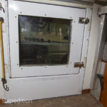The double-pane pass-through window to the cab is made of Lexan and securely locked from inside.