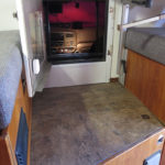 When we camp, we unlock the crawl-through window in the cab in case we need to climb through in an emergency.