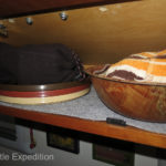Overhead shelves in the kitchen were designed to hold what we knew was going to be stored there.