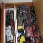 No waste of space & no bottomless pits. Tools must be accessible without unpacking gear and digging.
