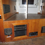 From left to right: horn button, Eberspaecher air intake and off-on switch for Hunter heater fan, Hunter radiator output, CO2 LP detector, battery compartment vent, master 12 V breaker switch.